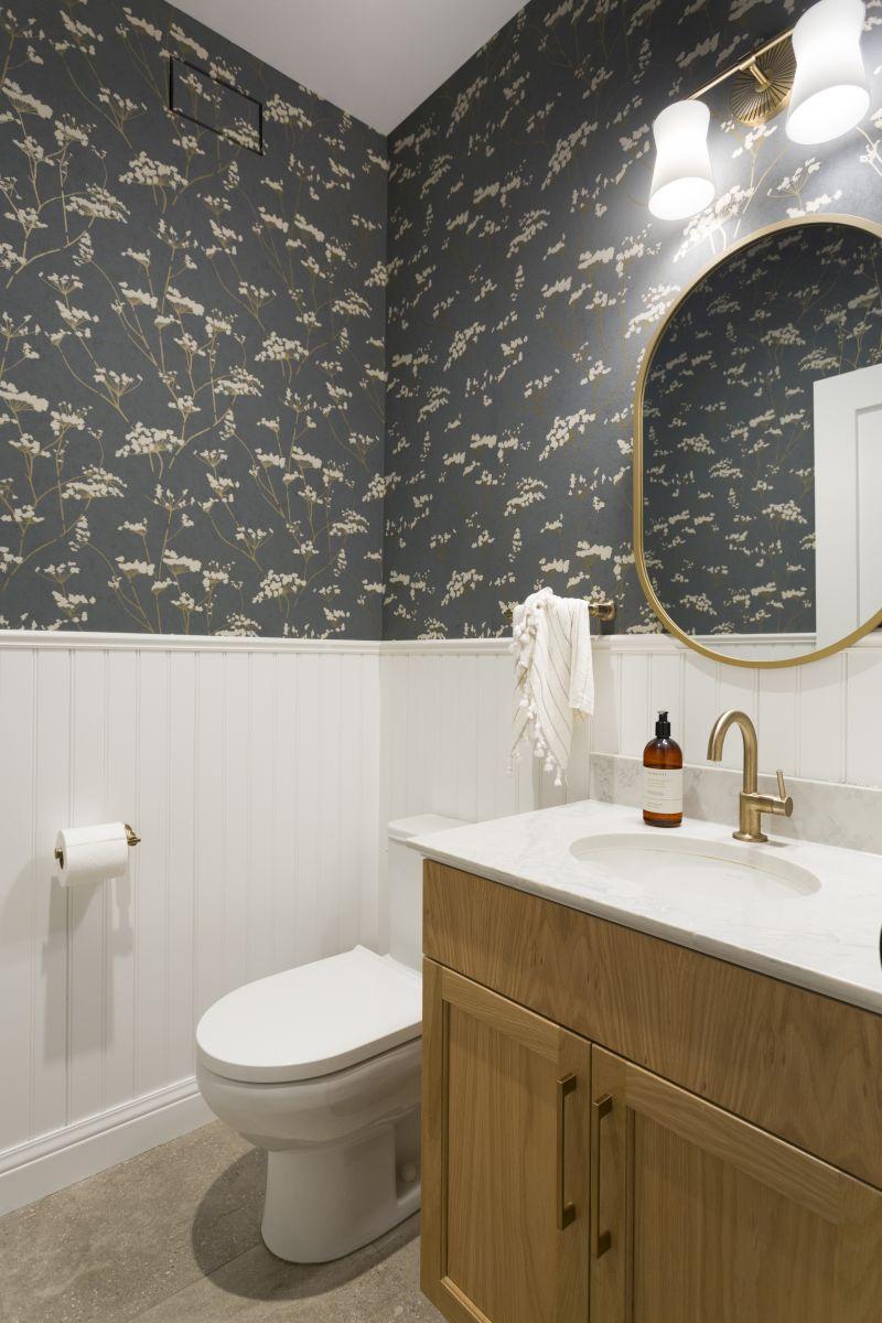 wall paneling and wallpaper powder room